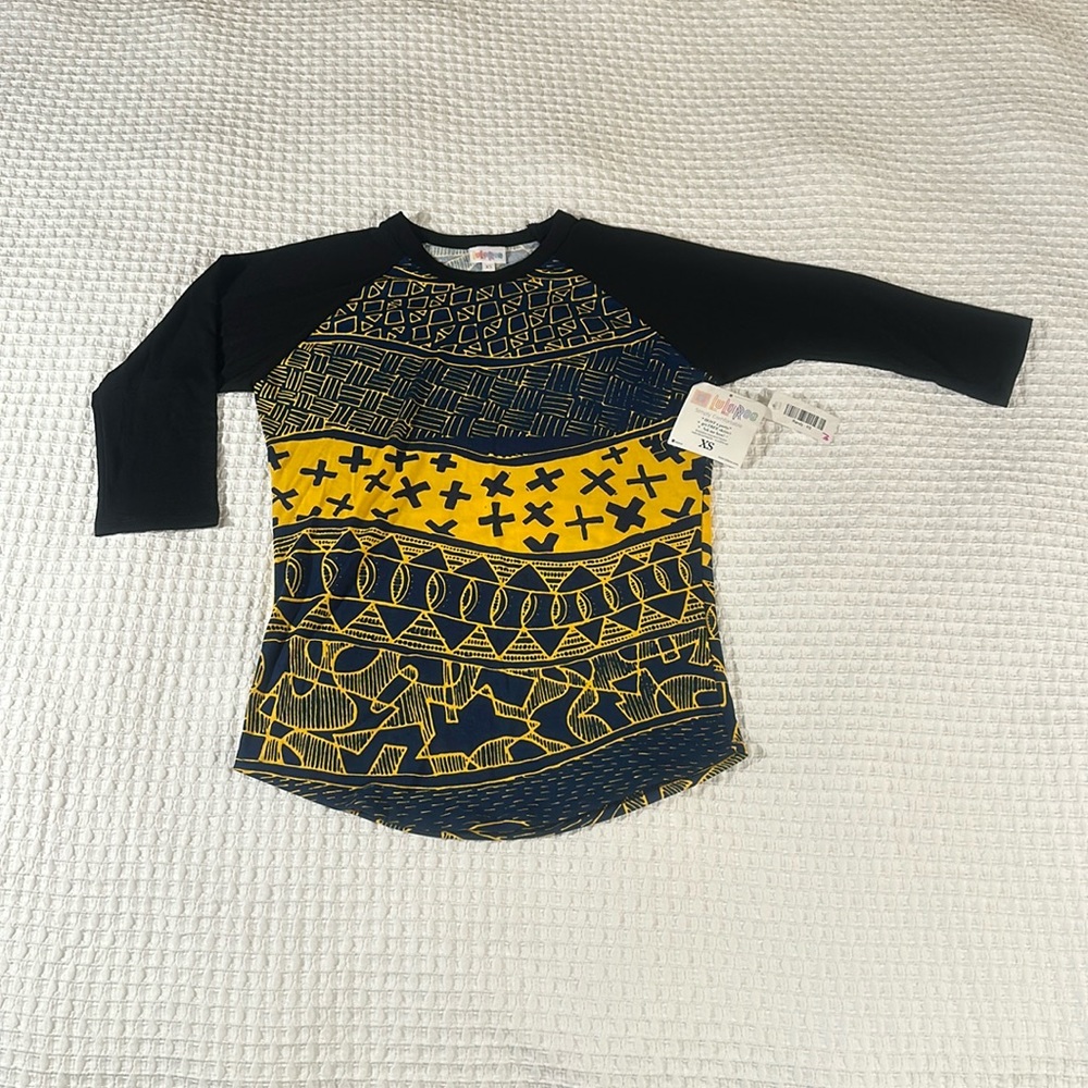 LuLaRoe Women’s Randy Tee/Size: XS/Color:Black Sleeves-Blue-Yellow Patterns(NWT)